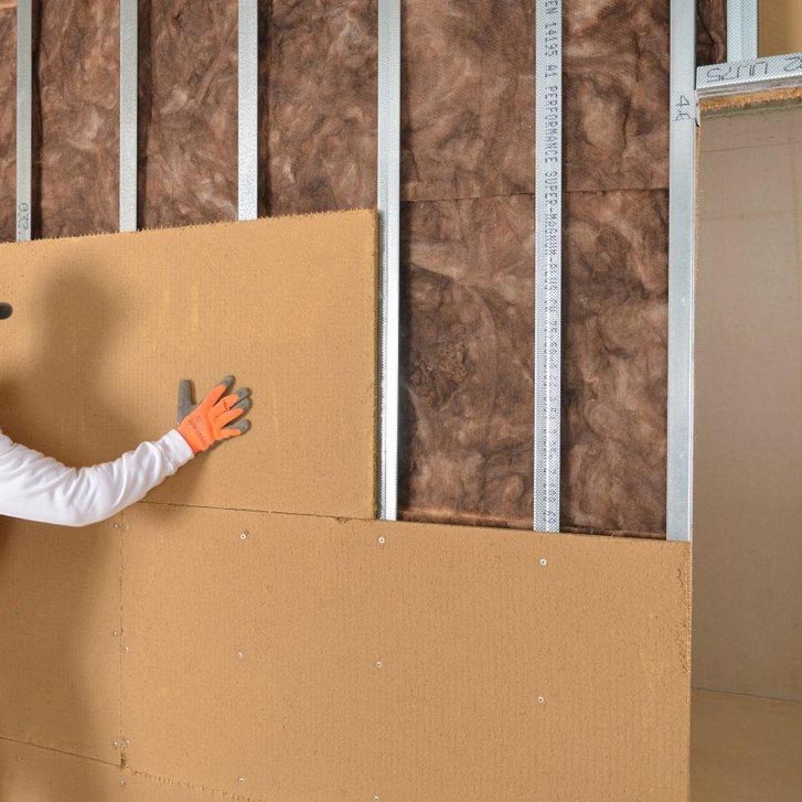 Wood fibre board FiberTherm Isorel installation on walls